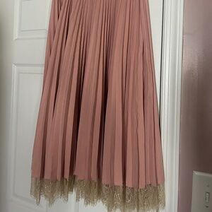 Dusty pink pleated skirt with ivory lace trim